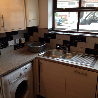 Kitchen fitting 8 roof and extension